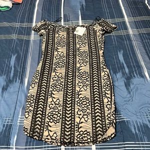 Off the shoulder dress.